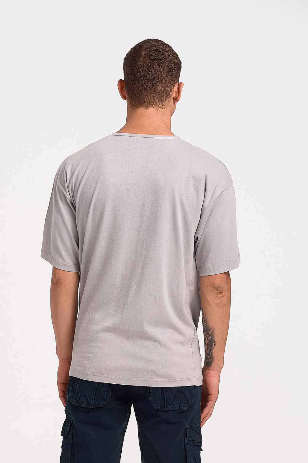 Short-sleeved LION blouse with button and pocket