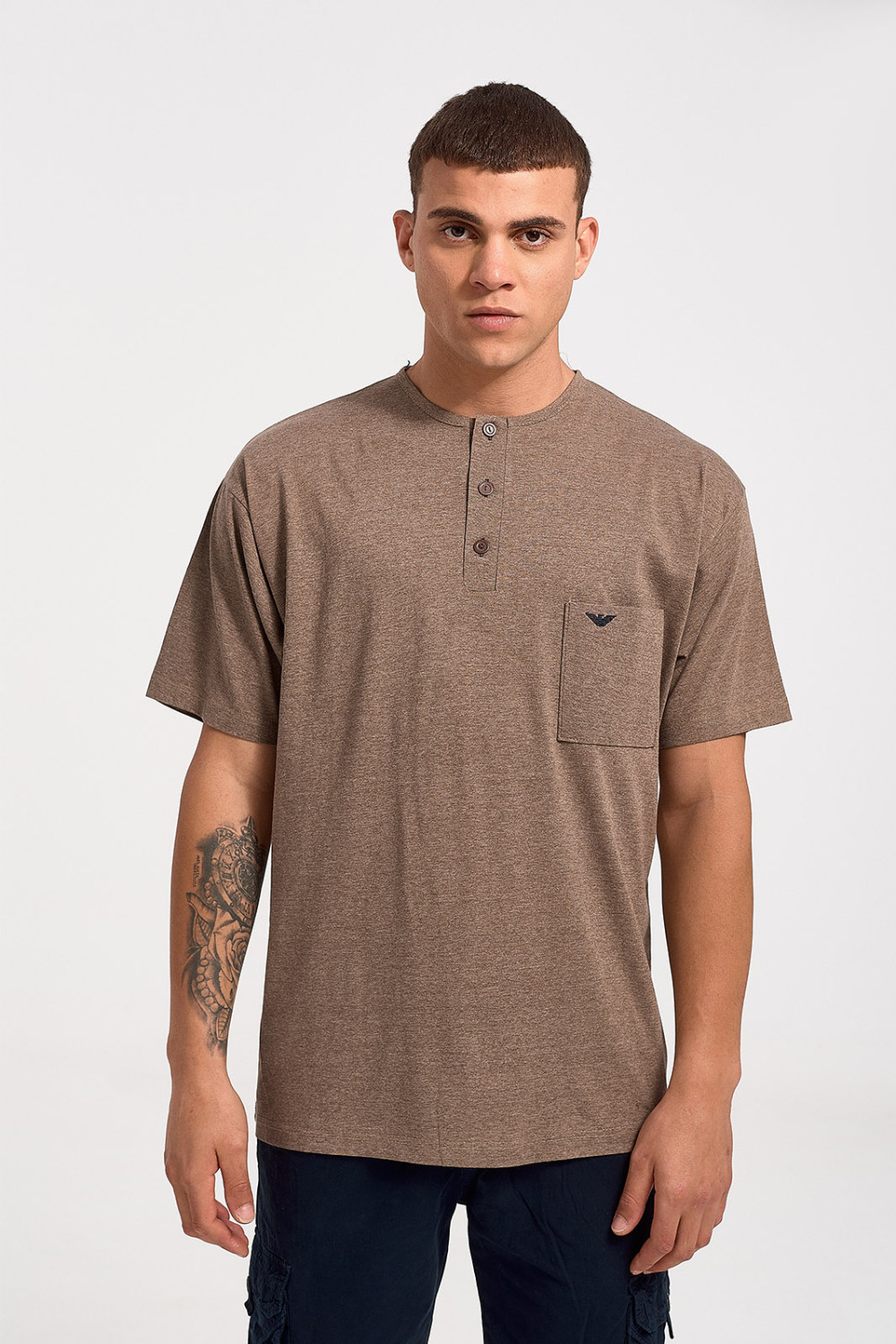 Short-sleeved LION blouse with button and pocket