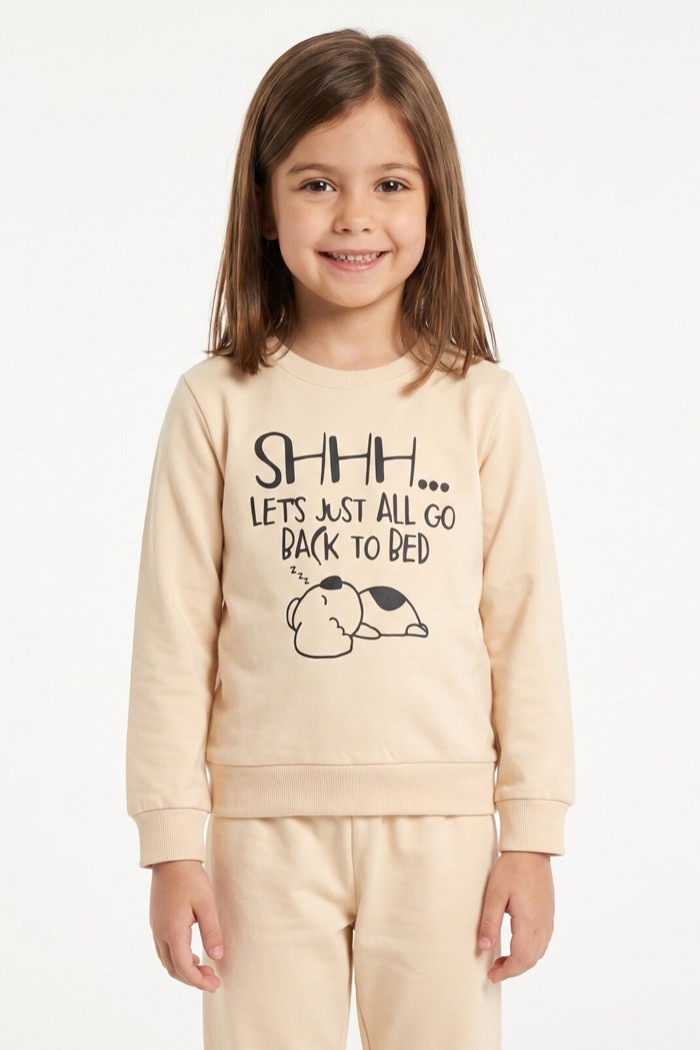 TRAX girls' powder-pink pyjama set with long-sleeved printed top and matching trousers